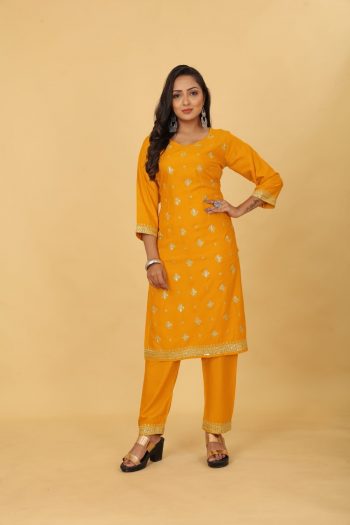 ATTRACTIVE RAYON EMBROIDERY SEQUENCE WORK KURTI PANT YELLOW