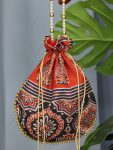 LATEST SILK CRAPE AZARAKH PRINTED WITH PEARL BORDER AND DORI WORK POTLI PURSE (2)