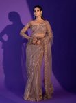 FANCY NET ZARI SEQUENCE WITH JHALAR LACE WORK SAREE WITH UNSTITCHED BLOUSE CHIKU