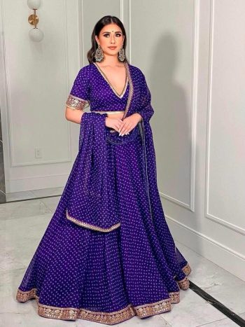 LATEST GEORGETTE PRINTED ZARI THREAD BORDER WORK LEHENGA CHOLI WITH DUPATTA PURPLE