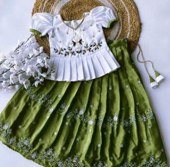 FANCY CHINON ZARI WITH FLOWERS DESIGN BORDER WITH MATCHING TASSELS KID'S TOP WITH LEHENGA GREEN
