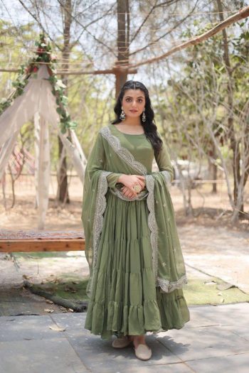 MODERN GEORGETTE PLAIN FRILL WORK GOWN WITH  SEQUENCE EMBROIDERY WORK DUPATTA  PISTA