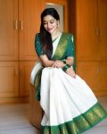 DESIGNER LICHI SILK JACQUARD WORK SAREE WITH UNSTITCHED BLOUSE GREEN