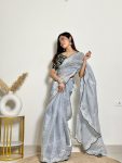 MODERN EMBROIDERY WORK SEQUENCE AND JARI WITH ARC BORDER JIMMY CHOO SAREE WITH STITCHED BLOUSE GREY