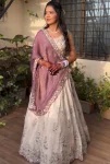 MODERN CHINON EMBROIDERY THREAD AND SEQUENCE WORK LEHENGA CHOLI WITH DUPATTA OFF WHITE AND LAVENDER