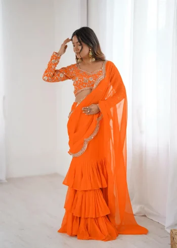 FANCY GEORGETTE THREAD & SEQUENCE EMBROIDERY WORK TYPE RUFFLE WORK LEHENGA SAREE WITH STITCHED BLOUSE ORANGE