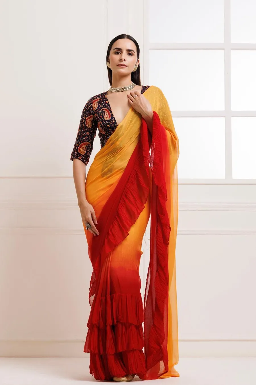 FANCY-GEORGETTE-RUFFLE-WORK-SAREE-WITH-UNSTITCHED-BLOUSE-PARTY-WEAR-WHOLESALE-PRICE-ETHNIC-GARMENT-1.webp