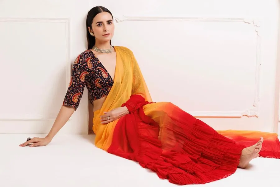 FANCY-GEORGETTE-RUFFLE-WORK-SAREE-WITH-UNSTITCHED-BLOUSE-PARTY-WEAR-WHOLESALE-PRICE-ETHNIC-GARMENT-8.webp