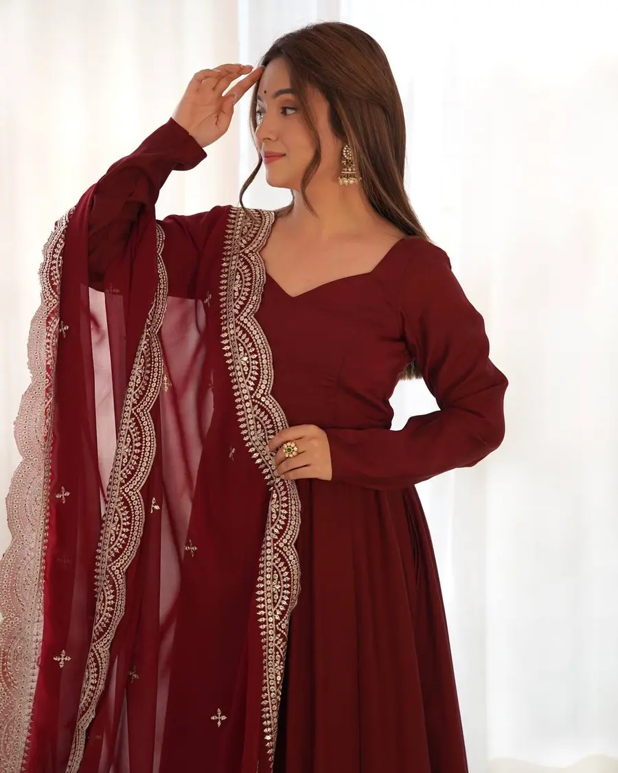 FANCY-ROMAN-CHANDERI-PLAIN-GOWN-BOTTOM-WITH-EMBROIDERY-SEQUENCE-WORK-DUPATTA-FESTIVE-WEAR-WHOLESALE-PRICE-ETHNIC-GARMENT-33.webp