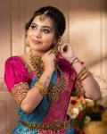 MODERN-LICHI-SILK-JACQUARD-WORK-SAREE-WITH-UNSTITCHED-BLOUSE-FESTIVE-WEAR-WHOLESALE-PRICE-ETHNIC-GARMENT-3.webp
