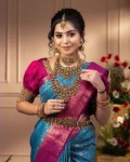 MODERN-LICHI-SILK-JACQUARD-WORK-SAREE-WITH-UNSTITCHED-BLOUSE-FESTIVE-WEAR-WHOLESALE-PRICE-ETHNIC-GARMENT-3.webp