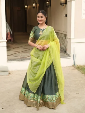 MODERN SHIMMER WEAVING BORDER AND SILVER-GOLDEN ZARI DETAILING AND BORDER WORK LEHENGA CHOLI WITH DUPATTA GREEN