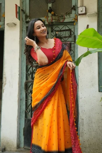 RICH LOOK LINEN COTTON IKKAT PRINTED WITH PUM PUM LACE BORDER WORK SAREE WITH UNSTITCHED BLOUSE YELLOW