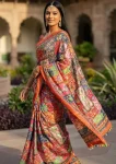 TRENDING ROMAN SILK AJARAKH PRINT AND REAL MIRROR WORK WITH PIPING BORDER WORK SAREE WITH UNSTITCHED BLOUSE FESTIVE WEAR WHOLESALE PRICE ETHNIC GARMENT (3)