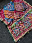 TRENDING ROMAN SILK AJARAKH PRINT AND REAL MIRROR WORK WITH PIPING BORDER WORK SAREE WITH UNSTITCHED BLOUSE PARTY WEAR WHOLESALE PRICE EHNIC GARMENT (4)