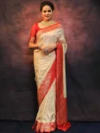 RICH LOOK LICHI SILK JACQUARD WORK SAREE WITH UNSTITCHED BLOUSE CREAM AND ORANGE