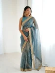 MODERN JACQUARD BUTTI SILK FANCY LACE BORDER WORK SAREE WITH UNSTITCHED BLOUSE TEAL