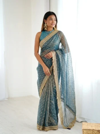 MODERN JACQUARD BUTTI SILK FANCY LACE BORDER WORK SAREE WITH UNSTITCHED BLOUSE TEAL