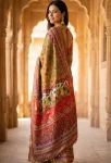 TRENDING ROMAN SILK AJARAKH PRINT WITH REAL MIRROR WORK SAREE WITH UNSTITCHED BLOUSE PARTY WEAR WHOLESALE PRICE ETHNIC GARMENT (7)