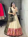 DESIGNER PAITHANI SILK ZARI WEAVING WORK WITH COLORED BORDER AND BUTTI WORK LEHENGA CHOLI WITH DUPATTA OFF WHITE AND MEHNDI
