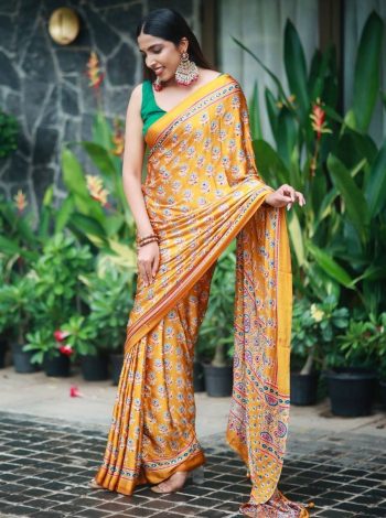 FANCY CREPE SILK AJRAKH PRINT WITH REAL MIRROR WORK SAREE WITH UNSTITCHED BLOUSE YELLOW