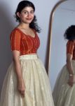 MODERN SPACE SILK SEQUENCE EMBROIDERY WORK LEHENGA CHOLI CREAM AND ORANGE