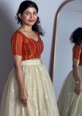 MODERN SPACE SILK SEQUENCE EMBROIDERY WORK LEHENGA CHOLI CREAM AND ORANGE