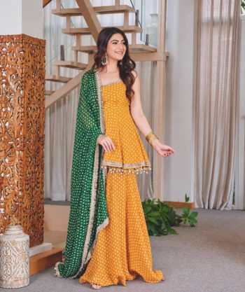 MODERN GEORGETTE BANDHEJ PRINT WITH FANCY LACE WITH HANGING LATKAN WORK KEDIYA STYLE TOP PALAZZO WITH DUPATTA YELLOW