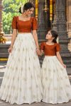 MODERN-RANGOLI-CRUSH-SEQUENCE-EMBROIDERY-AND-STYLISH-BHUNGALI-PIPE-WORK-MOTHER-DAUGHTER-SET-FESTIVE-WEAR-WHOLESALE-PRICE-ETHNIC-GARMENT-3.jpg
